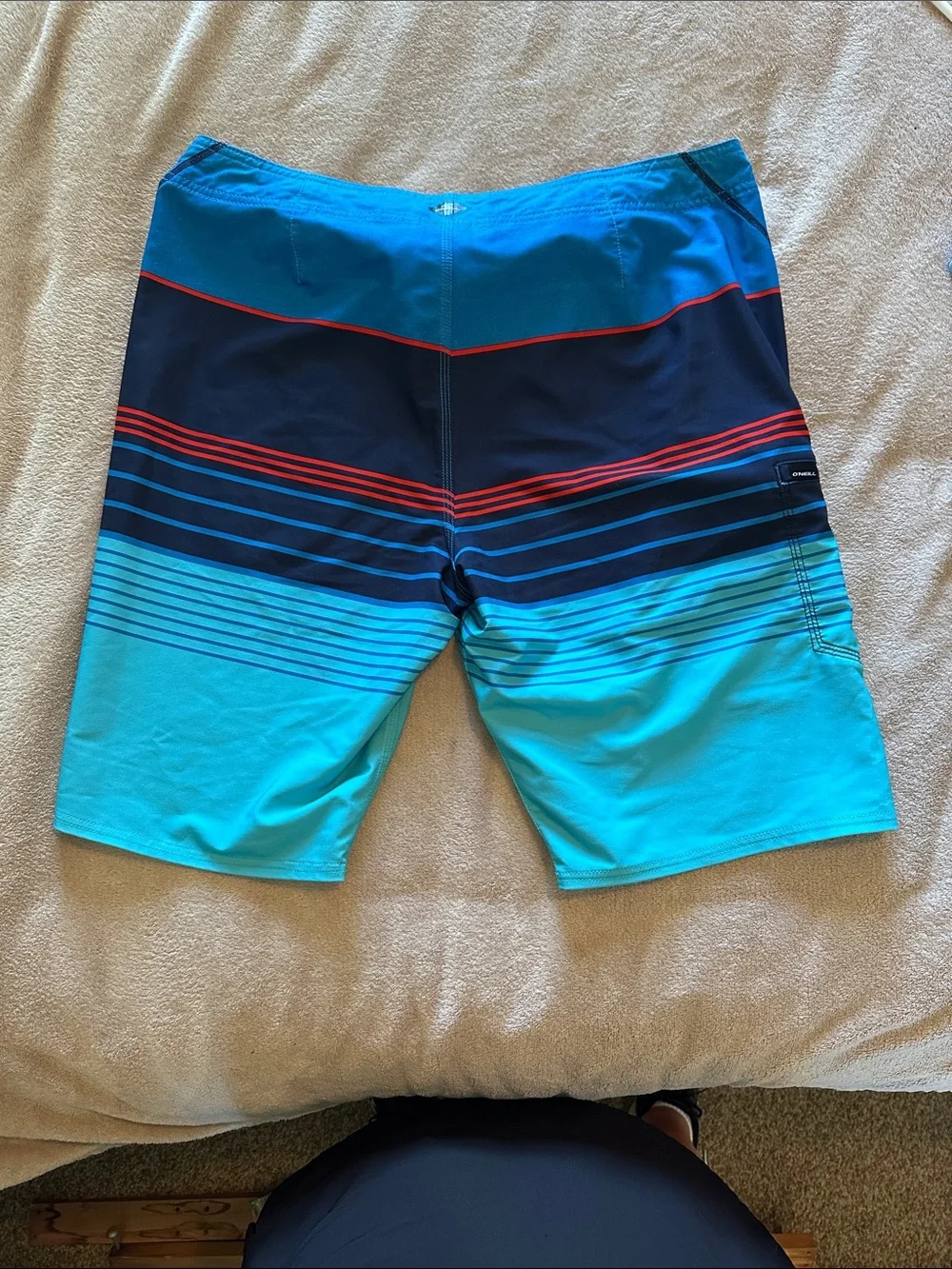 O'Neill Men's Aqua & Navy Striped Board Shorts with Red Accent
